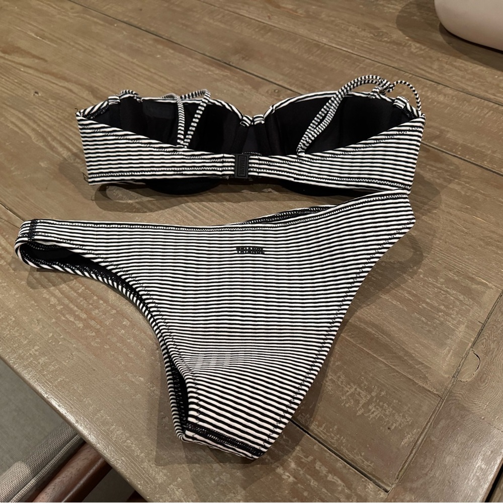 Triangl 2 piece bikini, size medium top and bottom, black and white stripe